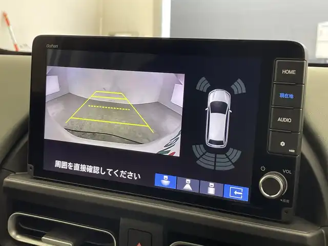 ホンダ フリード ハイブリット e:HEV クロスター 滋賀県 2025(令7)年 0.1千km プラチナホワイトパール 登録済未使用車/純正9インチナビ/【Bluetooth/フルセグTV/Apple CarPlay/Android Auto】/ホンダセンシング/・衝突軽減ブレーキ（CMBS）/・先行車発進お知らせ機能/・歩行者事故低減ステアリング/・路外逸脱抑制機能/・標識認識機能/・渋滞追従機能付アダプティブクルーズコントロール/・車線維持支援システム（LKAS）/・トラフィックジャムアシスト（渋滞運転支援機能）/・ブラインドスポットインフォメーション/・誤発進抑制機能/・後方誤発進抑制機能/・近距離衝突軽減ブレーキ/・急アクセル抑制機能/・パーキングセンサーシステム/・後退出庫サポート/・オートハイビーム/・アダプティブドライビングビーム/両側パワースライドドア/電動パーキングブレーキ/オートブレーキホールド/プッシュスタート/スマートキー/ステアリングリモコン