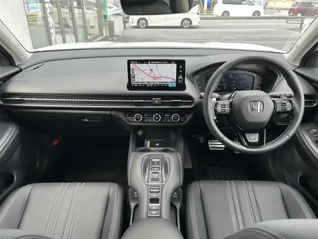 ホンダ ＺＲ－Ｖ ハイブリッド e:HEV Z 埼玉県 2025(令7)年 0.2万km パール ・ワンオーナー/新車1か月点検（5月26日）　6か月点検（9月28日）/・Honda SENSING/・前後ドライブレコーダー/・後退出庫サポート/・アダプティブドライビングビーム/・マルチビューカメラシステム/・Honda CONNECTディスプレー（TVキャンセラー）/・＋ETC2.0車載器＋ワイヤレス充電器/・本革シート＋運転席8ウェイ助手席4ウェイパワーシート/・ドライビングポジションシステム付/・運転席＆助手席シートヒーター/・BOSEプレミアムサウンドシステム(12スピーカー)/・ハンズフリーアクセスパワーテールゲート/(予約クローズ機能付)/・18インチアルミホイール(切削＋ベルリナブラック)/・ステアリングヒーター/・レーダークルーズコントロール/・イルミネーションスカッフプレート/・電子パキングブレーキ/・オートホールド/・オートライト/・LEDヘットライト/・BSM/・コーナーセンサー/・保証書/・取説/・スマートキー×２/・プレミアムグラスコーティング新車時施工メンテナンスキット車載