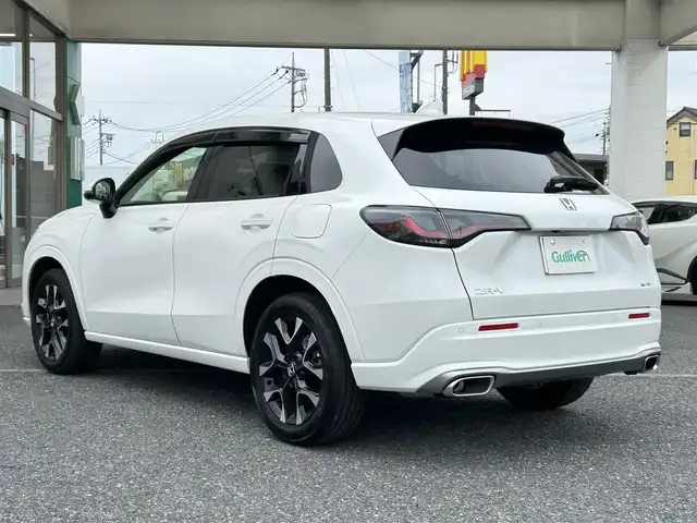ホンダ ＺＲ－Ｖ ハイブリッド e:HEV Z 埼玉県 2025(令7)年 0.2万km パール ・ワンオーナー/新車1か月点検（5月26日）　6か月点検（9月28日）/・Honda SENSING/・前後ドライブレコーダー/・後退出庫サポート/・アダプティブドライビングビーム/・マルチビューカメラシステム/・Honda CONNECTディスプレー（TVキャンセラー）/・＋ETC2.0車載器＋ワイヤレス充電器/・本革シート＋運転席8ウェイ助手席4ウェイパワーシート/・ドライビングポジションシステム付/・運転席＆助手席シートヒーター/・BOSEプレミアムサウンドシステム(12スピーカー)/・ハンズフリーアクセスパワーテールゲート/(予約クローズ機能付)/・18インチアルミホイール(切削＋ベルリナブラック)/・ステアリングヒーター/・レーダークルーズコントロール/・イルミネーションスカッフプレート/・電子パキングブレーキ/・オートホールド/・オートライト/・LEDヘットライト/・BSM/・コーナーセンサー/・保証書/・取説/・スマートキー×２/・プレミアムグラスコーティング新車時施工メンテナンスキット車載