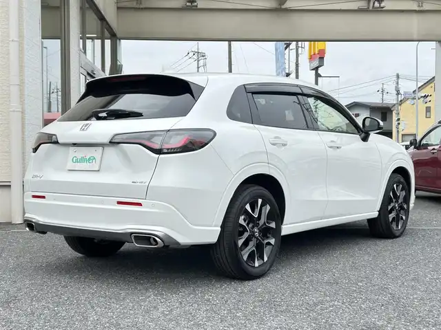 ホンダ ＺＲ－Ｖ ハイブリッド e:HEV Z 埼玉県 2025(令7)年 0.2万km パール ・ワンオーナー/新車1か月点検（5月26日）　6か月点検（9月28日）/・Honda SENSING/・前後ドライブレコーダー/・後退出庫サポート/・アダプティブドライビングビーム/・マルチビューカメラシステム/・Honda CONNECTディスプレー（TVキャンセラー）/・＋ETC2.0車載器＋ワイヤレス充電器/・本革シート＋運転席8ウェイ助手席4ウェイパワーシート/・ドライビングポジションシステム付/・運転席＆助手席シートヒーター/・BOSEプレミアムサウンドシステム(12スピーカー)/・ハンズフリーアクセスパワーテールゲート/(予約クローズ機能付)/・18インチアルミホイール(切削＋ベルリナブラック)/・ステアリングヒーター/・レーダークルーズコントロール/・イルミネーションスカッフプレート/・電子パキングブレーキ/・オートホールド/・オートライト/・LEDヘットライト/・BSM/・コーナーセンサー/・保証書/・取説/・スマートキー×２/・プレミアムグラスコーティング新車時施工メンテナンスキット車載