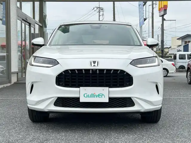 ホンダ ＺＲ－Ｖ ハイブリッド e:HEV Z 埼玉県 2025(令7)年 0.2万km パール ・ワンオーナー/新車1か月点検（5月26日）　6か月点検（9月28日）/・Honda SENSING/・前後ドライブレコーダー/・後退出庫サポート/・アダプティブドライビングビーム/・マルチビューカメラシステム/・Honda CONNECTディスプレー（TVキャンセラー）/・＋ETC2.0車載器＋ワイヤレス充電器/・本革シート＋運転席8ウェイ助手席4ウェイパワーシート/・ドライビングポジションシステム付/・運転席＆助手席シートヒーター/・BOSEプレミアムサウンドシステム(12スピーカー)/・ハンズフリーアクセスパワーテールゲート/(予約クローズ機能付)/・18インチアルミホイール(切削＋ベルリナブラック)/・ステアリングヒーター/・レーダークルーズコントロール/・イルミネーションスカッフプレート/・電子パキングブレーキ/・オートホールド/・オートライト/・LEDヘットライト/・BSM/・コーナーセンサー/・保証書/・取説/・スマートキー×２/・プレミアムグラスコーティング新車時施工メンテナンスキット車載