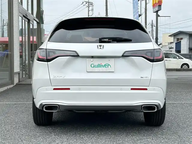 ホンダ ＺＲ－Ｖ ハイブリッド e:HEV Z 埼玉県 2025(令7)年 0.2万km パール ・ワンオーナー/新車1か月点検（5月26日）　6か月点検（9月28日）/・Honda SENSING/・前後ドライブレコーダー/・後退出庫サポート/・アダプティブドライビングビーム/・マルチビューカメラシステム/・Honda CONNECTディスプレー（TVキャンセラー）/・＋ETC2.0車載器＋ワイヤレス充電器/・本革シート＋運転席8ウェイ助手席4ウェイパワーシート/・ドライビングポジションシステム付/・運転席＆助手席シートヒーター/・BOSEプレミアムサウンドシステム(12スピーカー)/・ハンズフリーアクセスパワーテールゲート/(予約クローズ機能付)/・18インチアルミホイール(切削＋ベルリナブラック)/・ステアリングヒーター/・レーダークルーズコントロール/・イルミネーションスカッフプレート/・電子パキングブレーキ/・オートホールド/・オートライト/・LEDヘットライト/・BSM/・コーナーセンサー/・保証書/・取説/・スマートキー×２/・プレミアムグラスコーティング新車時施工メンテナンスキット車載