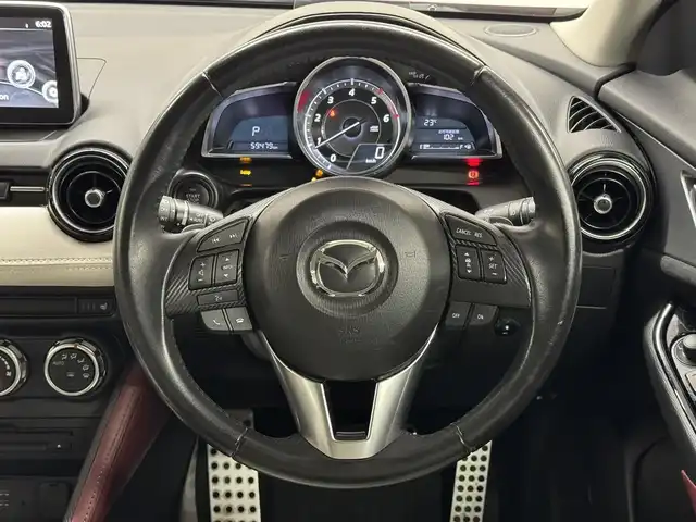 マツダ ＣＸ－３ XD ツーリング Lパッケージ 三重県 2015(平27)年 6万km ソウルレッドプレミアムメタリック 1.5L ディーゼルターボ/4WD/MTモード付フロア6AT/純正 7インチナビ/（FM/AM/aha/Stitcher/Bluetooth/USB/【OP】CD/AUX/DVD/TV）/バックカメラ/BOSEサウンドシステム＋7スピーカー/ドライブレコーダー 前方/ETC/安全/・スマートシティブレーキサポート（SCBS）/・スマートブレーキサポート（SBS）/・車線逸脱警報システム（LDWS）/・マツダレーダークルーズコントロール（MRCC）/・ブラインドスポットモニタリング（BSM：リヤクロストラフィックアラート機能付）/・車間認知支援システム/・ハイビームコントロールシステム（HBC）/装備/・ハーフレザーシート/・シートヒーター（D/N）/・オートエアコン/・オートライト/・LED ヘッドライト＆フロントフォグライト/・レインセンサーワイパー（オートフロントワイパー）/・パドルシフト/・ステアリングスイッチ/・プッシュスタート/・純正18inAW/・保/・予備スマートキーx1、リモコンエンジンスターターx1/など
