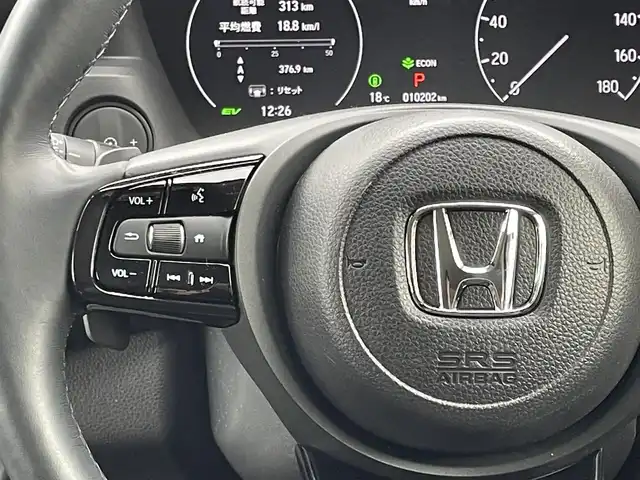 ホンダ ヴェゼル ハイブリッド e:HEV Z 宮城県 2023(令5)年 1.1万km プレミアムクリスタルレッドM 4WD/純正メモリーナビ/（ＦＭ／ＡＭ／Ｂｌｕｅｔｏｏｔｈ）　/フルセグテレビ　/ハーフレザーシート　/衝突被害軽減装置　/レーダークルーズコントロール　/レーンキープアシスト　/コーナーセンサー　/横滑り防止装置/パワーバックドア/フロントワイパーデアイサー/前席シートヒーター/ステアリングヒーター/ヒルディセントコントロール/全方位カメラ/バックカメラ/スマートキー/プッシュスタート/ETC2.0/純正ドライブレコーダー（前後）/オートライト/電動パーキングブレーキ/電動格納ミラー/置くだけ充電/スタッドレスタイヤAW付き/(215/60R16)