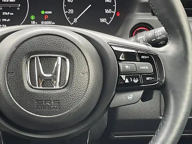 ホンダ ヴェゼル ハイブリッド e:HEV Z 宮城県 2023(令5)年 1.1万km プレミアムクリスタルレッドM 4WD/純正メモリーナビ/（ＦＭ／ＡＭ／Ｂｌｕｅｔｏｏｔｈ）　/フルセグテレビ　/ハーフレザーシート　/衝突被害軽減装置　/レーダークルーズコントロール　/レーンキープアシスト　/コーナーセンサー　/横滑り防止装置/パワーバックドア/フロントワイパーデアイサー/前席シートヒーター/ステアリングヒーター/ヒルディセントコントロール/全方位カメラ/バックカメラ/スマートキー/プッシュスタート/ETC2.0/純正ドライブレコーダー（前後）/オートライト/電動パーキングブレーキ/電動格納ミラー/置くだけ充電/スタッドレスタイヤAW付き/(215/60R16)