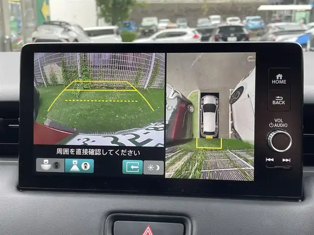 ホンダ ヴェゼル ハイブリッド e:HEV Z 宮城県 2023(令5)年 1.1万km プレミアムクリスタルレッドM 4WD/純正メモリーナビ/（ＦＭ／ＡＭ／Ｂｌｕｅｔｏｏｔｈ）　/フルセグテレビ　/ハーフレザーシート　/衝突被害軽減装置　/レーダークルーズコントロール　/レーンキープアシスト　/コーナーセンサー　/横滑り防止装置/パワーバックドア/フロントワイパーデアイサー/前席シートヒーター/ステアリングヒーター/ヒルディセントコントロール/全方位カメラ/バックカメラ/スマートキー/プッシュスタート/ETC2.0/純正ドライブレコーダー（前後）/オートライト/電動パーキングブレーキ/電動格納ミラー/置くだけ充電/スタッドレスタイヤAW付き/(215/60R16)