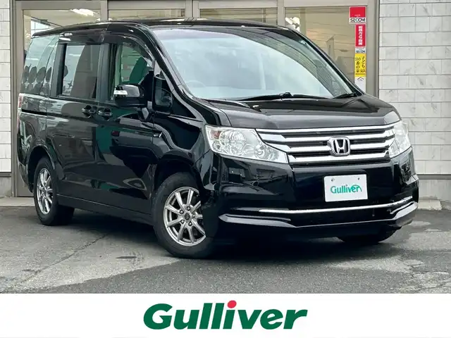 ホンダ ステップワゴン G コンフォートセレクション 岩手県 2012(平24)年 13.2万km クリスタルブラックパール 4WD/社外ナビ（型式ＡＶＩＣ－ＭＲＺ０３）/両側電動ドア　/バックカメラ　/ＥＴＣ　/フロントワイパーデアイサー　/クルーズコントロール　/スマートキー　/オートライト　/リアワイパー　/アイドリングストップ　/横滑り防止装置/ドアバイザー/フロアマット/取説 ナビ取説