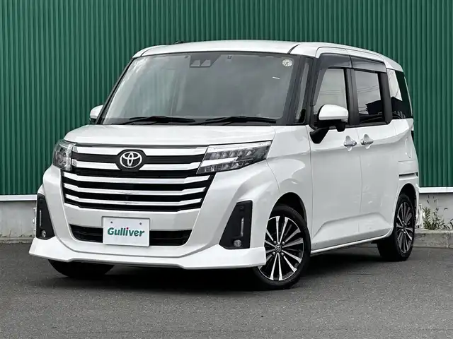 トヨタ ルーミー カスタムG－T 宮城県 2022(令4)年 3.7万km パールホワイトⅢ パノラミックビュー対応ナビレディパッケージ/・ステアリングスイッチ/・パノラミックビューモニター/コンフォートパッケージ/・シートヒーター/・シートバックテーブル/＝＝＝/スマートアシスト/・衝突警報機能/・衝突回避支援ブレーキ機能/・ブレーキ制御付誤発進抑制機能/・先行車発進お知らせ機能/・アダプティブドライビングビーム/・アダプティブクルーズコントロール/・ふらつき警報/・サイドビューランプ/・コーナーセンサー/・路側逸脱警報/・標識認識機能/純正9インチナビ（NSZT-Y68T）/・CD/DVD/・Bluetooth/フルセグTV/ビルトインETC2.0/ドライブレコーダー/両側電動スライドドア/革巻きステアリング/電動パーキングブレーキ/ブレーキホールド/LEDヘッドランプ/フォグランプ/オートライ/スマートキー＆プッシュスタート/電動格納ミラー/純正15インチAW/純正フロアマット/純正ドアバイザー/Wエアバッグ