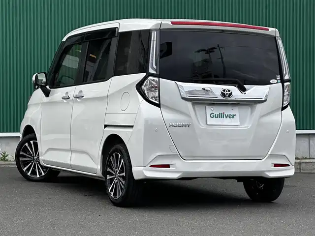 トヨタ ルーミー カスタムG－T 宮城県 2022(令4)年 3.7万km パールホワイトⅢ パノラミックビュー対応ナビレディパッケージ/・ステアリングスイッチ/・パノラミックビューモニター/コンフォートパッケージ/・シートヒーター/・シートバックテーブル/＝＝＝/スマートアシスト/・衝突警報機能/・衝突回避支援ブレーキ機能/・ブレーキ制御付誤発進抑制機能/・先行車発進お知らせ機能/・アダプティブドライビングビーム/・アダプティブクルーズコントロール/・ふらつき警報/・サイドビューランプ/・コーナーセンサー/・路側逸脱警報/・標識認識機能/純正9インチナビ（NSZT-Y68T）/・CD/DVD/・Bluetooth/フルセグTV/ビルトインETC2.0/ドライブレコーダー/両側電動スライドドア/革巻きステアリング/電動パーキングブレーキ/ブレーキホールド/LEDヘッドランプ/フォグランプ/オートライ/スマートキー＆プッシュスタート/電動格納ミラー/純正15インチAW/純正フロアマット/純正ドアバイザー/Wエアバッグ