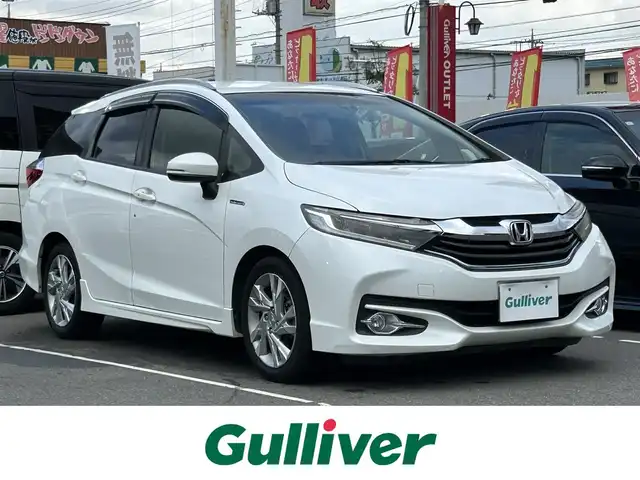 ホンダ シャトル ハイブリッド Z スタイルエディション 群馬県 2016(平28)年 9.3万km ホワイトオーキッドパール あんしんパッケージ/コンフォートビューパッケージ/ルーフレール/社外SDナビ/CD・DVD・SD/Bluetooth・フルセグTV/バックカメラ/ドライブレコーダー/ビルトインETC/エンジンスターター/パドルシフト/クルーズコントロール/横滑り防止装置/衝突軽減ブレーキ/スマートキー×2