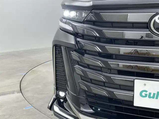 トヨタ ヴェルファイア Z プレミア 岡山県 2025(令7)年 0.4万km ブラック モデリスタエアロ/純正13インチフリップダウンモニター/寒冷地仕様/・リアLEDフォグランプ/・ウインドシールドデアイサー/・エンブレムヒーター/スペアタイヤ/HDMI入力端子（センターコンソールBOX内）/サンセットブラウンプレミアムナッパ本革/左右独立ムーンルーフ /純正14インチディスプレイオーディオ/コネクティッドナビ対応/HDMI/地デジ/USB//Bluetooth/AppleCarPlay/Androidauto/ETC2.0/パノラミックビューモニター/アクセサリーコンセントAC100V/トヨタセーフティセンス /・プリクラッシュセーフティ/・緊急時操蛇支援/・レーントレーシングアシスト/・レーダークルーズコントロール/・アダプティブハイビーム/ブラインドスポットモニター/前後方ドライブレコーダー（ディスプレイ内蔵）/トヨタチームメイト/・アドバンストパーク/・アドバンストドライブ/カラーヘッドアップディスプレイ/三眼LEDヘッドランプ/デジタルインナーミラー/パワーバックドア/エグゼクティブパワーシート /快適温熱シート/ベンチレーション/両側パワースライドドア
