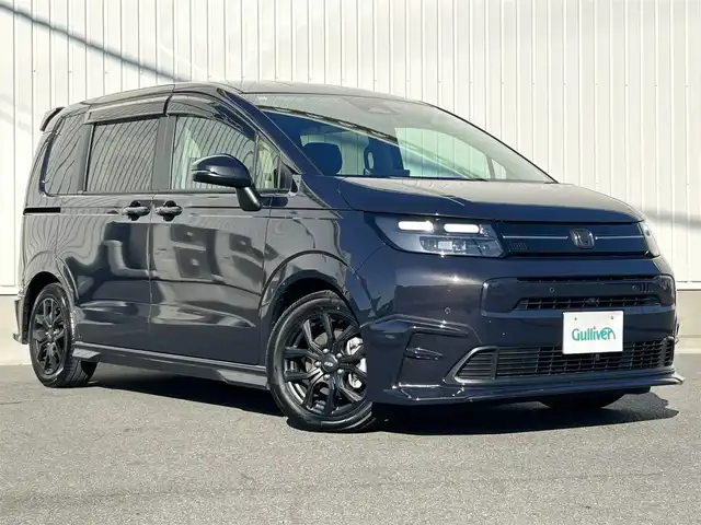 ホンダ フリード ハイブリット e:HEV AIR EX 群馬県 2024(令6)年 3万km トワイライトミストブラックパール 純正11.4インチナビ/  (CD/DVD/MSV/SD/USB/BT)/フルセグTV/全方位カメラ/両側パワースライド/ホンダセンシング/　・衝突軽減ブレーキ/　・後方誤発信制御/　・歩行者事故低減ステアリング/　・車線維持支援システム/　・渋滞追従付きアクティブクルコン/　・誤発進制御/　・オートハイビーム/　・ブラインドスポットインフォメーション/　・パーキングセンサー/　・レーンキープアシスト/ETC/オートホールド/シートヒーター/ハーフレザー/リアクーラー/無限エアロ/無限アルミ/リアツインモニター(アルパイン)/フルLEDヘッドライト/純正フロアマット/純正ドアバイザー