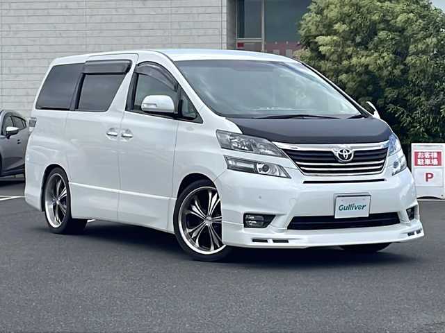 トヨタ ヴェルファイア 2．4Z プラチナセレクション 鹿児島県 2009(平21)年 5.3万km ホワイトパールクリスタルシャイン 社外ナビ/フルセグ/バックカメラ/ステアリングスイッチ/フリップダウンモニター/両側パワースライドドア/クルーズコントロール/パワーバックドア/RS-R車高調/社外20インチAW/社外エアロ/スマートキー