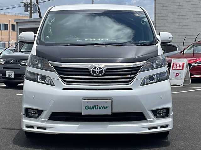 トヨタ ヴェルファイア 2．4Z プラチナセレクション 鹿児島県 2009(平21)年 5.3万km ホワイトパールクリスタルシャイン 社外ナビ/フルセグ/バックカメラ/ステアリングスイッチ/フリップダウンモニター/両側パワースライドドア/クルーズコントロール/パワーバックドア/RS-R車高調/社外20インチAW/社外エアロ/スマートキー