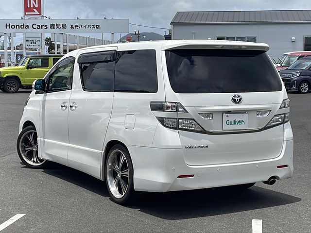 トヨタ ヴェルファイア 2．4Z プラチナセレクション 鹿児島県 2009(平21)年 5.3万km ホワイトパールクリスタルシャイン 社外ナビ/フルセグ/バックカメラ/ステアリングスイッチ/フリップダウンモニター/両側パワースライドドア/クルーズコントロール/パワーバックドア/RS-R車高調/社外20インチAW/社外エアロ/スマートキー