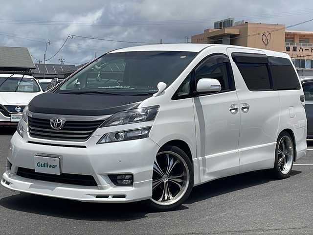 トヨタ ヴェルファイア 2．4Z プラチナセレクション 鹿児島県 2009(平21)年 5.3万km ホワイトパールクリスタルシャイン 社外ナビ/フルセグ/バックカメラ/ステアリングスイッチ/フリップダウンモニター/両側パワースライドドア/クルーズコントロール/パワーバックドア/RS-R車高調/社外20インチAW/社外エアロ/スマートキー