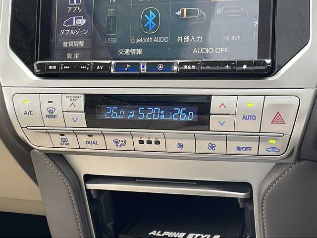 トヨタ ランドクルーザー プラド TX Lパッケージ マットブラED 京都府 2022(令4)年 1.5万km ホワイトパールクリスタルシャイン アルパイン9インチナビ　DVD再生　フルセグ　Bluetoothオーディオ　HDMI　バックカメラ　サンルーフ　ルーフレール　ベージュ革シート　シートベンチレーター　7人乗り　レーダークルーズ　禁煙車