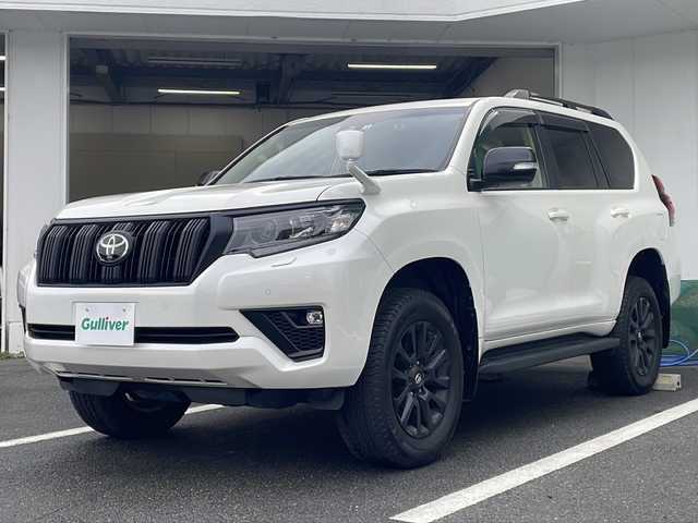 トヨタ ランドクルーザー プラド TX Lパッケージ マットブラED 京都府 2022(令4)年 1.5万km ホワイトパールクリスタルシャイン アルパイン9インチナビ　DVD再生　フルセグ　Bluetoothオーディオ　HDMI　バックカメラ　サンルーフ　ルーフレール　ベージュ革シート　シートベンチレーター　7人乗り　レーダークルーズ　禁煙車