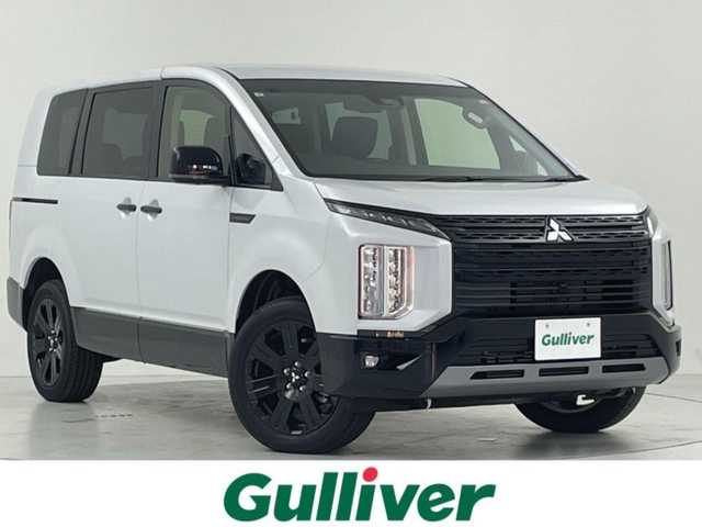 三菱 デリカＤ：５ シャモニー 大阪府 2025(令7)年 0.1千km ホワイトダイヤモンド 三菱e-Assist/　・衝突被害軽減ブレーキ　FCM/　・車線逸脱警報システム　LDW/　。レーダークルーズコントロール　ACC/　・オートマチックハイビーム　AHB/　。後側方車両検知警報システム　BSW/　・誤発進抑制機能/バックカメラ/両側パワースライドドア/パワーバックドア/LEDオートライト/フォグランプ/パドルシフト/ステアリングヒーター/革巻きステアリング/スマートキー/電子パーキング/ブレーキホールド/電動格納ウィンカーミラー