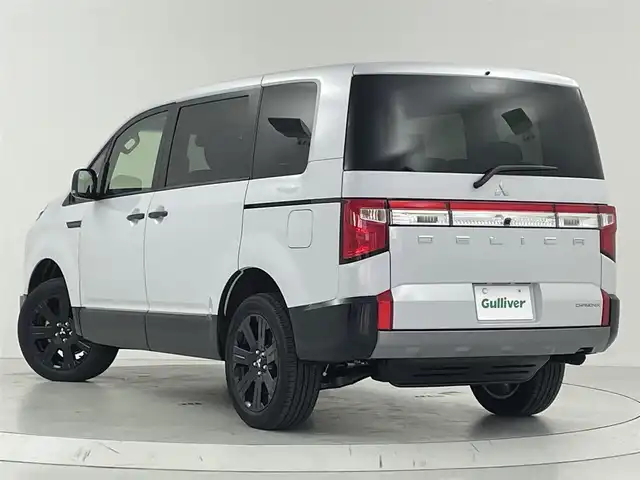 三菱 デリカＤ：５ シャモニー 大阪府 2025(令7)年 0.1千km ホワイトダイヤモンド 三菱e-Assist/　・衝突被害軽減ブレーキ　FCM/　・車線逸脱警報システム　LDW/　。レーダークルーズコントロール　ACC/　・オートマチックハイビーム　AHB/　。後側方車両検知警報システム　BSW/　・誤発進抑制機能/バックカメラ/両側パワースライドドア/パワーバックドア/LEDオートライト/フォグランプ/パドルシフト/ステアリングヒーター/革巻きステアリング/スマートキー/電子パーキング/ブレーキホールド/電動格納ウィンカーミラー