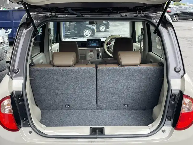 スズキ ラパン ＬＣ X 滋賀県 2024(令6)年 1.8万km フォーンベージュメタリック/アーバンブラウン 2トーン 純正7インチディスプレイオーディオ/【Bluetooth/USB】/バックカメラ/リアソナー/レーンキープアシスト/衝突軽減ブレーキ/LEDヘッドライト/オートマチックハイビーム/純正フロアマット/ビルトインETC/D/Nシートヒーター/プッシュスタート/スマートキー/ステアリングリモコン