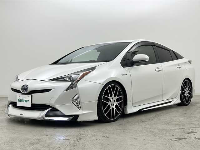 トヨタ プリウス S ツーリングセレクション 宮城県 2016(平28)年 7.5万km ホワイトパールクリスタルシャイン 禁煙車/モデリスタエアロ（F.S.R）/トヨタセーフティーセンス/・プリクラッシュセーフティーシステム/・レーダークルーズコントロール/・レーンディバ―チャーアラート/・レーントレーシングアシスト/・オートマチックハイビーム/前席シートヒーター/純正7インチＳＤナビ/（BT.AM.FM.CD.DVD.SD）/バックカメラ/フルセグテレビ/ビルトインETC/革巻きステアリング/ステアリングスイッチ/プッシュスタートスマートキー/合皮シート/純正フロアマット/純正ドアバイザー/LEDヘッドライト/LEDフォグランプ/社外19インチアルミホイール/ダウンサス/アイドリングストップ/横滑り防止機能