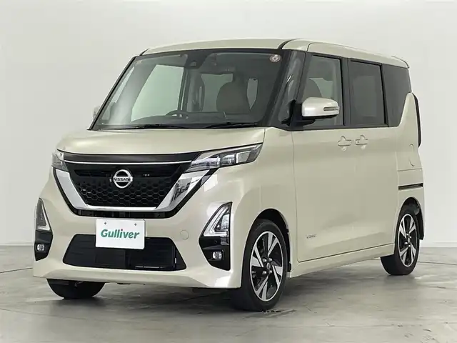 日産 ルークス HWS Gターボ プロパイロットED 群馬県 2022(令4)年 2.3万km フローズンバニラパール プレミアムグラデーションインテリア&快適パックA/・本革巻ステアリング（ブラウン）/・レザー調インストパネル/ドアトリムクロス（合皮） /・シート地（合皮/トリコット）/・プラズマクラスター搭載リヤシーリングファン /・パーソナルテーブル〈後席〉/カップホルダー/USBソケット〈助手席シートバック部〉/・ロールサンシェード〈リヤ〉/・撥水加工シート/＝＝＝＝＝＝＝/純正9インチディスプレイオーディオ/・AM/FM/Bluetooth/USB/・AppleCarPlay/AndroidAuto/アラウンドビューモニター/ビルトインETC/ナビ連動純正ドライブレコーダー/プロパイロット/エマージェンシーブレーキ/踏み間違い衝突防止アシスト/インテリジェントLI（車線逸脱防止支援システム）/LDW（車線逸脱警報）/インテリジェント FCW（前方衝突予測警報）/インテリジェント DA（ふらつき警報）/標識検知機能/先行車発進お知らせ/スマートキー/プッシュスタート/LEDヘッドライト