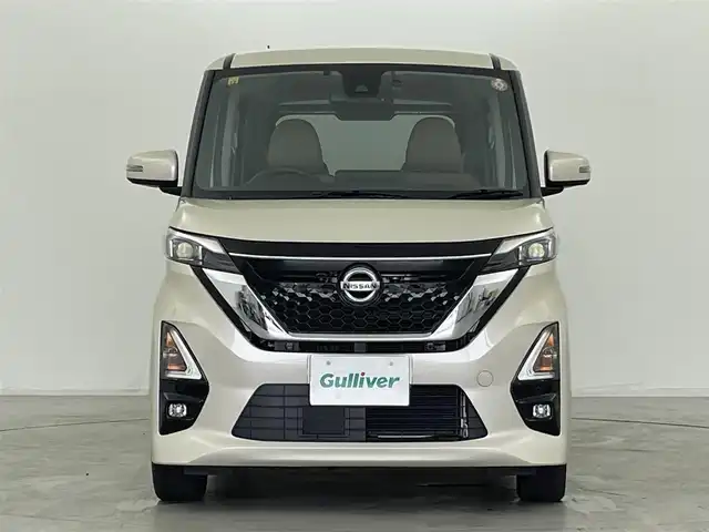 日産 ルークス HWS Gターボ プロパイロットED 群馬県 2022(令4)年 2.3万km フローズンバニラパール プレミアムグラデーションインテリア&快適パックA/・本革巻ステアリング（ブラウン）/・レザー調インストパネル/ドアトリムクロス（合皮） /・シート地（合皮/トリコット）/・プラズマクラスター搭載リヤシーリングファン /・パーソナルテーブル〈後席〉/カップホルダー/USBソケット〈助手席シートバック部〉/・ロールサンシェード〈リヤ〉/・撥水加工シート/＝＝＝＝＝＝＝/純正9インチディスプレイオーディオ/・AM/FM/Bluetooth/USB/・AppleCarPlay/AndroidAuto/アラウンドビューモニター/ビルトインETC/ナビ連動純正ドライブレコーダー/プロパイロット/エマージェンシーブレーキ/踏み間違い衝突防止アシスト/インテリジェントLI（車線逸脱防止支援システム）/LDW（車線逸脱警報）/インテリジェント FCW（前方衝突予測警報）/インテリジェント DA（ふらつき警報）/標識検知機能/先行車発進お知らせ/スマートキー/プッシュスタート/LEDヘッドライト