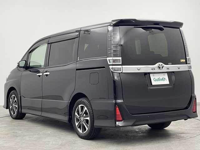 トヨタ ヴォクシー ZS 煌Ⅱ 三重県 2020(令2)年 4.5万km ブラック 禁煙車/純正10型ナビ（NSZN-Z68T）/AM/FM/CD/DVD/BT/フルセグTV/バックカメラ/純正フリップダウンモニター /両側パワースライドドア/トヨタセーフティーセンス/プリクラッシュセーフティ/クルーズコントロール/クリアランスソナー /オートライト/オートハイビーム/LEDヘッドライト/前後ドライブレコーダー/電動格納ウインカーミラー