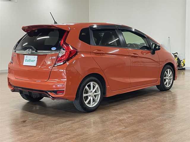 ホンダ フィット RS ホンダセンシング 道央・札幌 2018(平30)年 8.5万km サンセットオレンジⅡ 6MT/純正8型ナビ/フルセグTV/CD/DVD/BT/SD/USB/バックカメラ/寒冷地仕様/衝突軽減ブレーキ/レーンキープアシスト/横滑り防止/レーダークルーズコントロール/ワイパーデアイサー/プッシュスタート/スマートキー/純正ドラレコ/ビルトインETC/LEDヘッドライト/フォグランプ/ステアリングスイッチ/オートライト/ミラーヒーター/純正フロアマット/純正ドアバイザー/保証書/取扱説明書