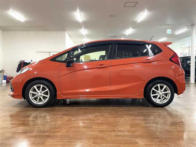 ホンダ フィット RS ホンダセンシング 道央・札幌 2018(平30)年 8.5万km サンセットオレンジⅡ 6MT/純正8型ナビ/フルセグTV/CD/DVD/BT/SD/USB/バックカメラ/寒冷地仕様/衝突軽減ブレーキ/レーンキープアシスト/横滑り防止/レーダークルーズコントロール/ワイパーデアイサー/プッシュスタート/スマートキー/純正ドラレコ/ビルトインETC/LEDヘッドライト/フォグランプ/ステアリングスイッチ/オートライト/ミラーヒーター/純正フロアマット/純正ドアバイザー/保証書/取扱説明書