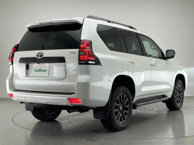 トヨタ ランドクルーザー プラド TX Lパッケージ マットブラED 愛知県 2023(令5)年 2万km ホワイトパールクリスタルシャイン 純正９型ＤＡナビ　ムーンルーフ　全方位カメラ　ベンチレーション　ＥＴＣ２．０　ドラレコ　シートヒーター　セーフティセンス　衝突軽減　追従クルコン　ＬＥＤオートライト　ＢＳＭ　ベージュ革　フォグランプ