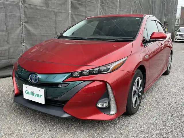 トヨタ プリウス ＰＨＶ A 千葉県 2017(平29)年 2.3万km エモーショナルレッド 純正11.6型縦型ナビ、フルセグTV/バックカメラ/トヨタセーフティセンス/純正LEDヘッドライト&LEDフォグ/純正15インチアルミホイール/ウィンカードアミラー/ステアリングヒーター/アダプティブクルーズコントロール/ブラインドスポットモニター/前席シートヒーター/オートライト/横滑り防止機能/ビルトインETC/充電器ケーブル付き/新車整備手帳/取扱説明書/スペアキー