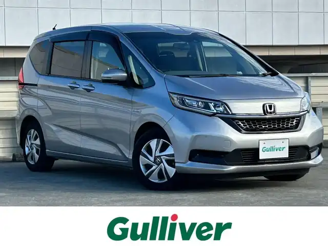 ホンダ フリード ハイブリット G ホンダセンシング 静岡県 2020(令2)年 5.2万km ルナシルバーM 7人乗り/純正7型ナビ/（フルセグTV/FM/AM/CD/DVD/Bluetooth/SD）/バックカメラ/ETC/両側電動スライド/追従クルーズコントロール/オートライト/LEDヘッドライト/スマートキー/プッシュスタート/チップアップシート/前後コーナーセンサー/純正フロアマット