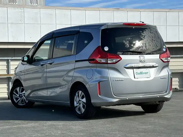 ホンダ フリード ハイブリット G ホンダセンシング 静岡県 2020(令2)年 5.2万km ルナシルバーM 7人乗り/純正7型ナビ/（フルセグTV/FM/AM/CD/DVD/Bluetooth/SD）/バックカメラ/ETC/両側電動スライド/追従クルーズコントロール/オートライト/LEDヘッドライト/スマートキー/プッシュスタート/チップアップシート/前後コーナーセンサー/純正フロアマット