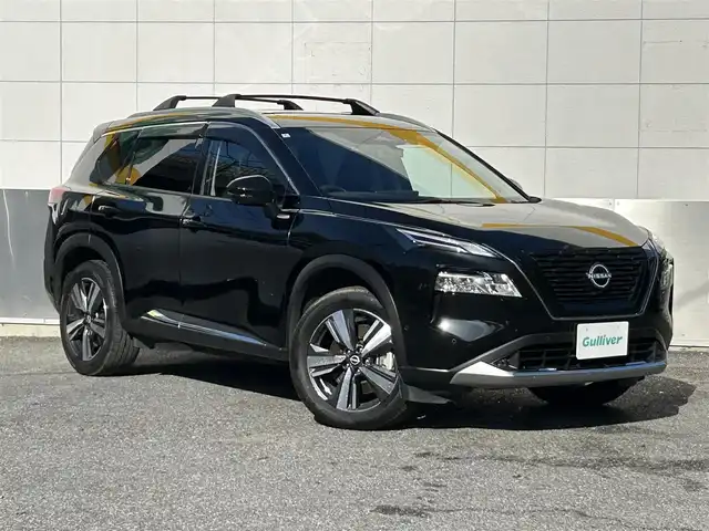 日産 エクストレイル G e－4ORCE 東京都 2022(令4)年 1.6万km ダイヤモンドブラック パノラミックガラスルーフ/BOSEプレミアムサウンドシステム/純正12.3インチディスプレイオーディオナビ/AM・FM/フルセグTV/Bluetooth/ＵＳＢ/　/AppleCarPlay/AndroidAuto//アラウンドビューモニター/ETC2.0/プロパイロット/インテリジェントルームミラー/インテリジェントクルーズコントロール（ハンドル支援）/インテリジェントエマージェンシーブレーキ/踏み間違い衝突防止アシスト/前方衝突予測警報/ふらつき警報/車線逸脱防止支援システム/ヘッドアップディスプレイ/ブラインドスポットモニター/ハンズフリーパワーバックドア/シルバールーフレール/プッシュスタート/革巻きステアリングホイール/純正前後ドライブレコーダー/パーキングアシスト/合皮シート（運転席シートメモリー）/パワーシート/シートヒーター/純正ドライブレコーダー/LEDヘッドライト/LEDフォグランプ/シーケンシャルターンランプ/置くだけ充電/革巻きステアリングホイール/ステアリングヒーター/電動オート格納ミラー/リバース連動機能ミラー/保証書/取扱説明書/スペアキー