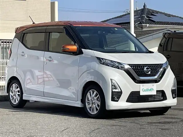 日産 デイズ ハイウェイスターX 山口県 2022(令4)年 0.2万km ホワイトパール/プレミアムサンシャインオレンジ 2トーン ワンオーナー /9型SDナビ フルセグTV CD DVD BT/アラウンドビューモニター/衝突被害軽減ブレーキ/レーンアシスト /オートマチックハイビーム/LEDオートヘッドライト/フォグライト /コーナーセンサー /ナビ連動ドラレコ/スマートキー 2個/ステアリングリモコン/革巻きステアリング/W サイド カーテン エアバッグ/保証書 取説