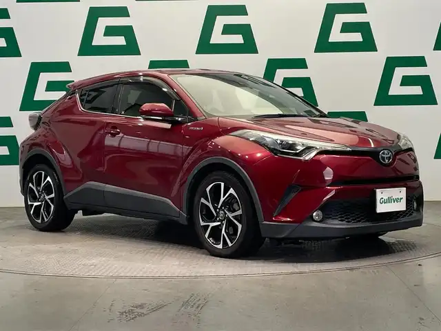 トヨタ Ｃ－ＨＲ G 鹿児島県 2017(平29)年 6.1万km センシュアルレッドマイカ 禁煙車　/純正ナビ　/・Ｂｌｕｅｔｏｏｔｈ　/・フルセグＴＶ　/・純正前方ドラレコ/バックカメラ　/前後コーナーセンサー　/トヨタセーフティセンス/・PCS/・LTA/・AHB/・レーダークルコン/・BSM/シートヒーター　/スマートキー　/Ｐスタート　/純正フロアマット　/純正ドアバイザー/純正アルミ