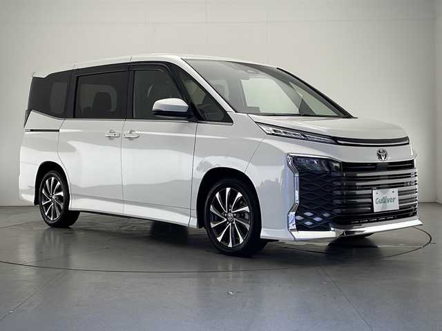トヨタ ヴォクシー S－Z 宮崎県 2022(令4)年 3.7万km ホワイトパールクリスタルシャイン Toyota Safety Sense/〇プリクラシュセーフティ/〇レーンディパーチャーアラート/〇プロアクティブドライビングアシスト/〇パーキングサポートブレーキ/〇ロードサインアシスト/〇オートマチックハイビーム/〇レーダークルーズコントロール/〇クリアランスソナー/〇発進遅れ告知/純正10.5インチナビ/フルセグTV/CD/DVD/Bluetooth/バックカメラ/純正14インチ後席ディスプレイ（V14T-R72R）/両側パワースライドドア/ハーフレザーシート/シートヒーター/LEDヘッドライト/ビルトインETC2.0/純正17インチAW/純正フロアマット/保証書/取扱説明書