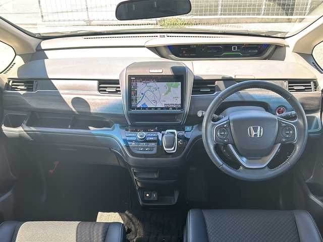 ホンダ フリード ハイブリット G ホンダセンシング 沖縄県 2020(令2)年 3.1万km クリスタルブラックパール 純正ナビ（ AM/FM/CD/DVD/BT ）/フルセグTV /衝突被害軽減装置 /両側パワスラ/純正ドラレコ/バックカメラ /ETC /クルーズコントロール /レーンキープアシスト /コーナーセンサー /シートヒーターD/N席