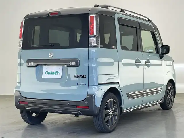 スズキ スペーシア ギア HYBRID XZターボ 愛知県 2022(令4)年 4.8万km オフブルーメタリック/ガンメタリック2トーンルーフ 純正ディスプレイ　ＤＶＤ　Ｂｌｕｅｔｏｏｔｈ　ＵＳＢ　バックカメラ　シートヒーター　両側パワースライドドア　ＬＥＤライト　フォグ　衝突軽減　追従クルコン　デュアルカメラブレーキ　純正１４インチアルミホイール　パドルシフト　ルーフレール　リヤパーキングセンサー　リアシェード　背面テーブル　禁煙車