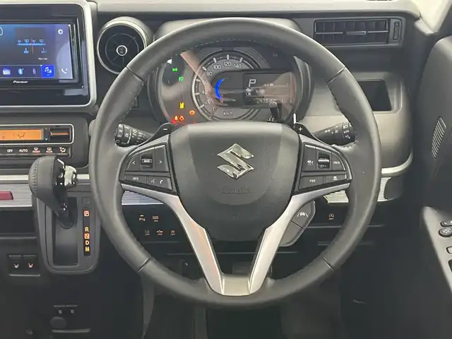 スズキ スペーシア ギア HYBRID XZターボ 愛知県 2022(令4)年 4.8万km オフブルーメタリック/ガンメタリック2トーンルーフ 純正ディスプレイ　ＤＶＤ　Ｂｌｕｅｔｏｏｔｈ　ＵＳＢ　バックカメラ　シートヒーター　両側パワースライドドア　ＬＥＤライト　フォグ　衝突軽減　追従クルコン　デュアルカメラブレーキ　純正１４インチアルミホイール　パドルシフト　ルーフレール　リヤパーキングセンサー　リアシェード　背面テーブル　禁煙車