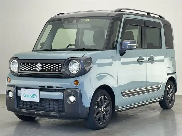 スズキ スペーシア ギア HYBRID XZターボ 愛知県 2022(令4)年 4.8万km オフブルーメタリック/ガンメタリック2トーンルーフ 純正ディスプレイ　ＤＶＤ　Ｂｌｕｅｔｏｏｔｈ　ＵＳＢ　バックカメラ　シートヒーター　両側パワースライドドア　ＬＥＤライト　フォグ　衝突軽減　追従クルコン　デュアルカメラブレーキ　純正１４インチアルミホイール　パドルシフト　ルーフレール　リヤパーキングセンサー　リアシェード　背面テーブル　禁煙車
