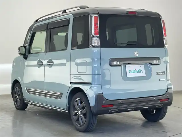 スズキ スペーシア ギア HYBRID XZターボ 愛知県 2022(令4)年 4.8万km オフブルーメタリック/ガンメタリック2トーンルーフ 純正ディスプレイ　ＤＶＤ　Ｂｌｕｅｔｏｏｔｈ　ＵＳＢ　バックカメラ　シートヒーター　両側パワースライドドア　ＬＥＤライト　フォグ　衝突軽減　追従クルコン　デュアルカメラブレーキ　純正１４インチアルミホイール　パドルシフト　ルーフレール　リヤパーキングセンサー　リアシェード　背面テーブル　禁煙車