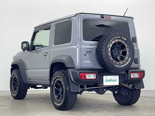 スズキ ジムニー シエラ JC 秋田県 2022(令4)年 1.1万km ミディアムグレー 4WD/9インチ社外ナビ(CD DVD SD BT フルセグ)/バックカメラ/クルーズコントロール/レーンキープアシスト/軽減衝突システム/25mmインチアップ/ロッソモデロリアマフラー/BFGoodrich/前席シートヒーター/ETC/LEDヘッドライト/LEDウィンカー/ドライブレコーダー/プッシュスタート/スマートキー/純正フロアマット/電動格納ミラー/ヘッドライトウォッシャー