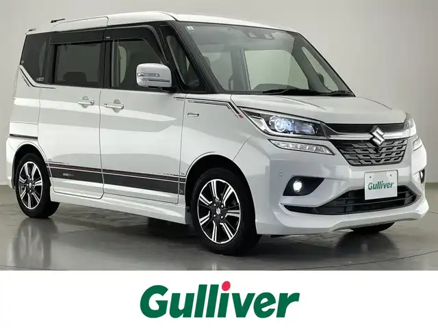 スズキ ソリオ バンディット HV MV 愛知県 2019(平31)年 5.6万km ピュアホワイトP 純正８型ナビ　フルセグＴＶ　全方位カメラＰＫＧ　デュアルカメラブレーキ　衝突軽減装置　追従クルコン　ＬＥＤオートライト　シートヒーター　コーナーセンサー　ナノイーＡＣ　両側パワースライドドア　ＵＳＢ　パドルシフト　純正フロアマット　禁煙車