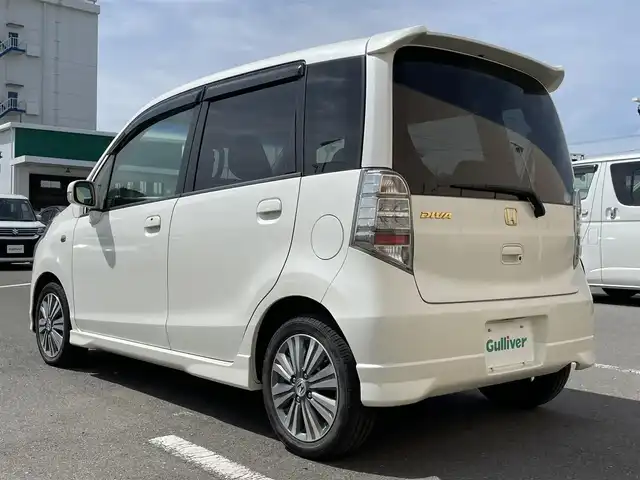 ホンダ ライフ ディーバ ターボパッケージ 東京都 2013(平25)年 4.2万km プレミアムホワイトパール ＨＩＤヘッドライト　/キーレスエントリー　/電子制御付ＡＢＳ　/フルオートエアコン　/純正フロアマット　/１４インチ純正アルミホイール　/ドアバイザー