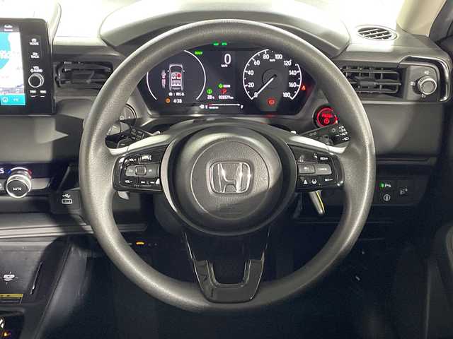 ホンダ ヴェゼル ハイブリッド e:HEV X 福岡県 2022(令4)年 2.9万km クリスタルブラックパール ・純正ナビ/・フルセグ/・Bluetooth/・ホンダセンシング/衝突軽減ブレーキ（CMBS）/車線維持支援システム（LKAS）/渋滞追従機能付アダプティブクルーズコントロール（ACC/路外逸脱抑制機能/先行車発進お知らせ機能/オートハイビーム/・プッシュスタート/・パドルシフト/・置くだけ充電/・電格ミラー/・ウィンカーミラー/・オートライト/・フォグライト/・ビルトインETC/・純正16インチAW