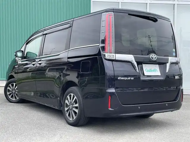 トヨタ エスクァイア ハイブリッド Gi プレミアムパッケージ 福岡県 2019(令1)年 6.3万km スパークリングブラックパールクリスタルシャイン レーンキープアシスト/盗難防止システム/衝突被害軽減システム/ドラレコ前後/車外カメラ/追従式クルコン/BT/9インチフルセグTV/純正フリップダウンモニター/ビルトインETC/純正AW/純正フロアマット/TRC/走行切替/サイドカーテン/Dualエアコン/ステアリングヒーター/LEDライト