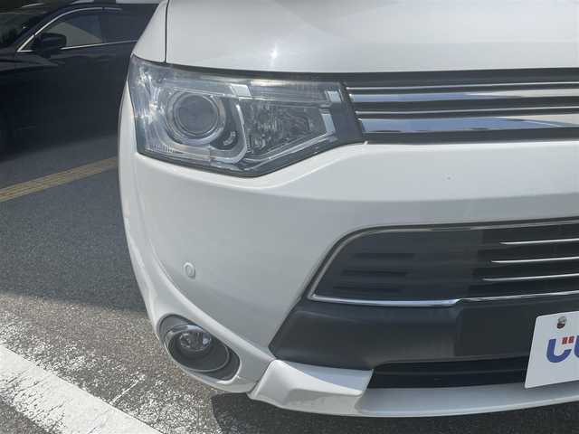 三菱 アウトランダー ＰＨＥＶ スポーツスタイルエディション 兵庫県 2015(平27)年 12.8万km シルキーホワイト (株)IDOMが運営する【じしゃロン西宮店】の自社ローン専用車両になります。こちらは現金またはオートローンご利用時の価格です。自社ローンご希望の方は別途その旨お申付け下さい				/*パワステ/*パワーウィンドウ/*クルコン/*USB有/*横滑り防止/*レーンキープアシスト/*盗難防止/*オートライト